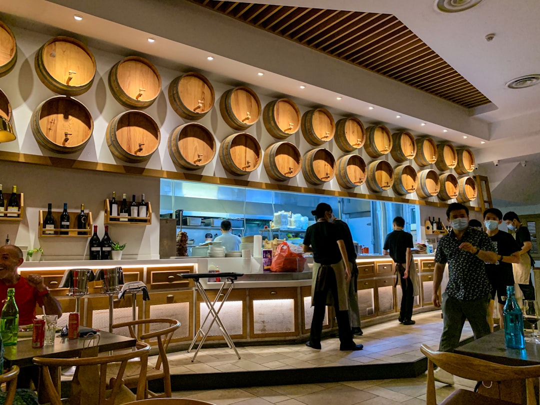 a-group-of-people-in-a-bar-n8gdaxm3lgw